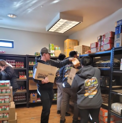 Wheatley Creek Services team volunteering at the Grand County Family Center food pantry