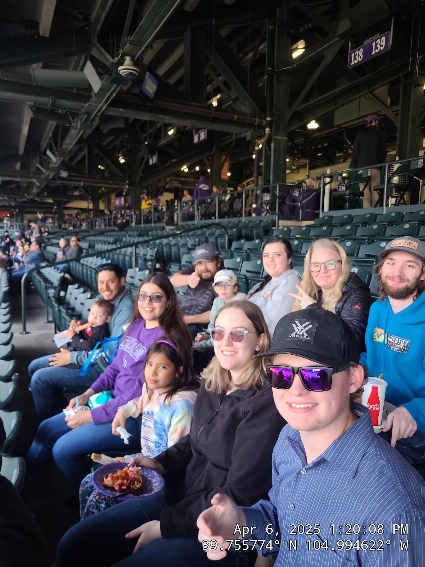 Wheatley Creek Services team and families enjoying a Colorado Rockies baseball game team outing
